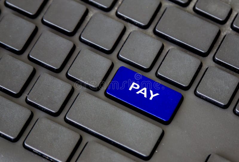 Blue pay button on black keypad