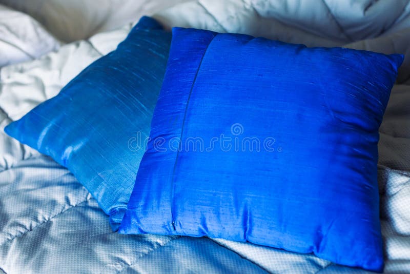 Blue pillows on a couch stock photo. Image of decorative 90448826