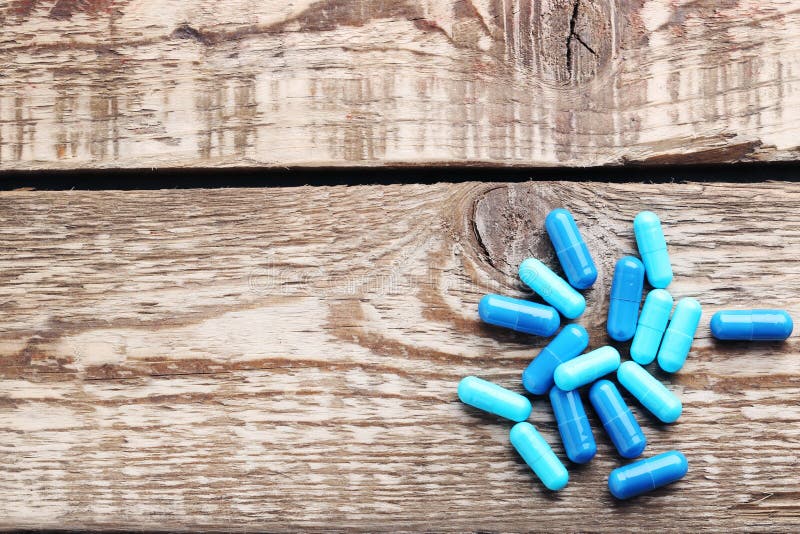Blue pills capsule
