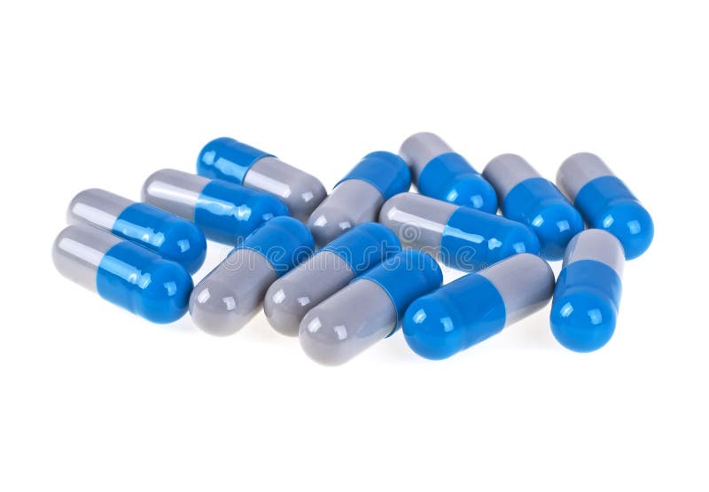 Blue pills on white background. Blue pills on a white background