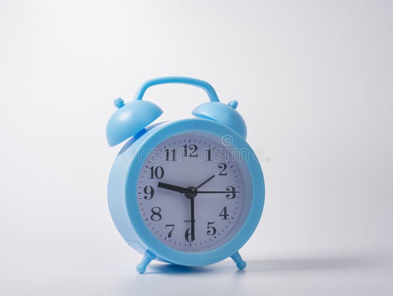 Blue Plastic Alarm Clock with Large Arabic Numerals on a White