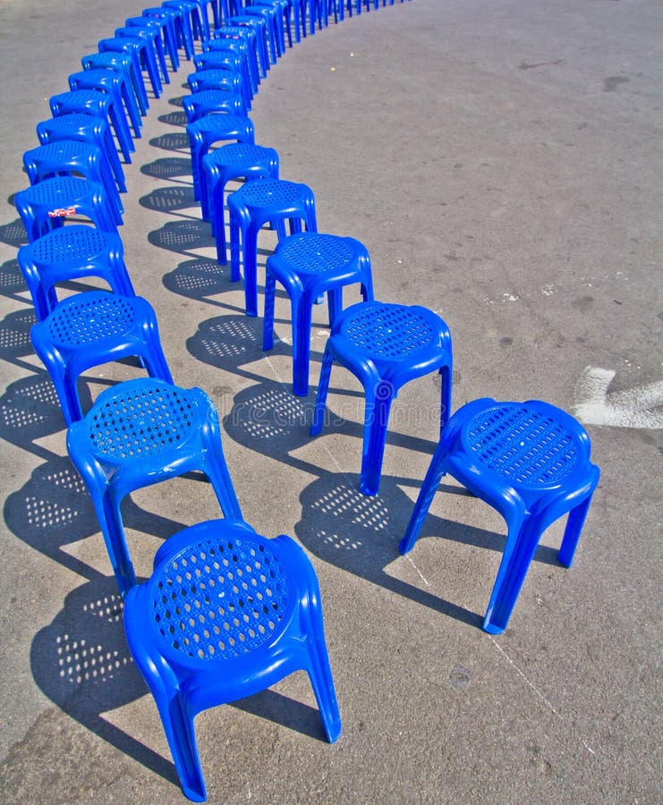 Blue plastic chairs stock image. Image of outdoor, business 35738837