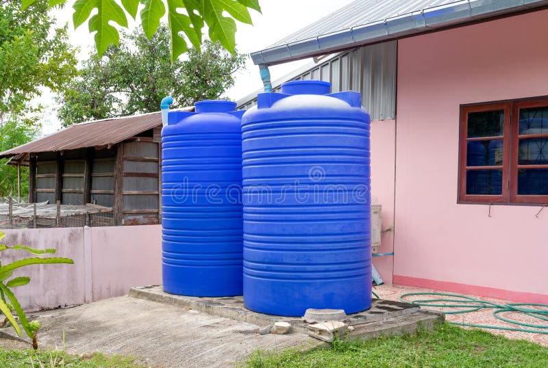 Big Blue Water Plastic Tank Stock Photo, Picture and Royalty Free