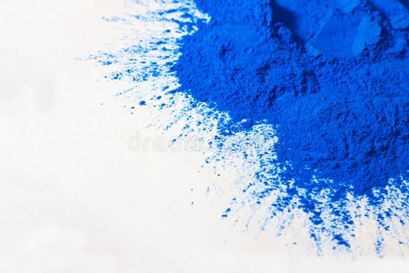 Blue powder on white stock image. Image of powdered, blue 24800495
