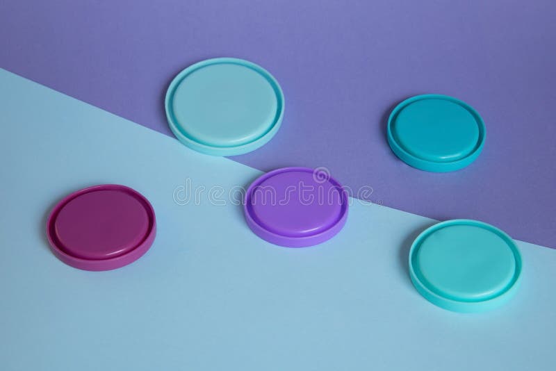 Blue and purple round plastic lids royalty free stock images
