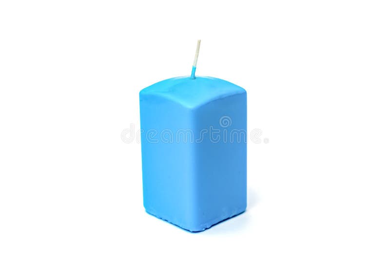 Blue rectangular candle for a holiday stock image