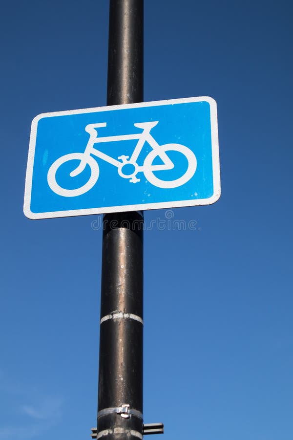 Blue rectangular cycle path route sign stock image