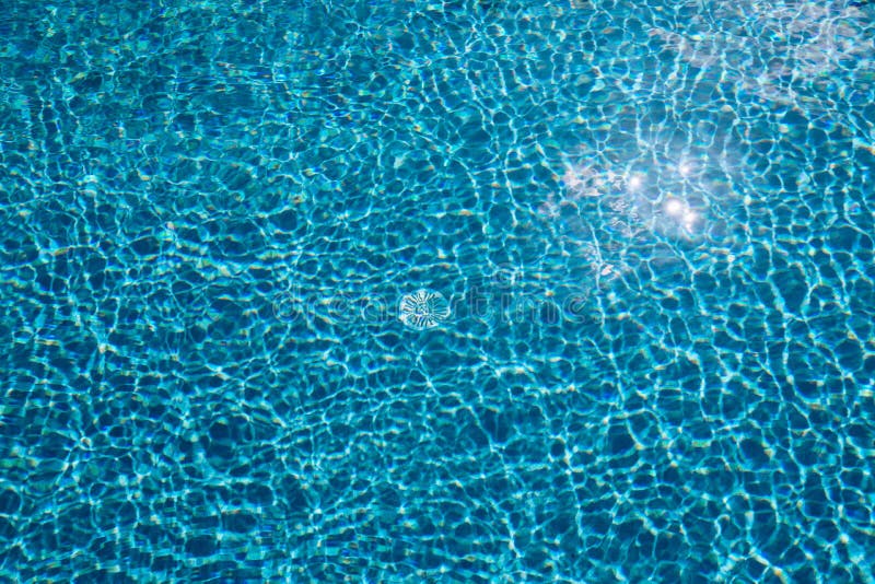 Blue Ripped Water in Swimming Pool. Surface of Blue Swimming Pool