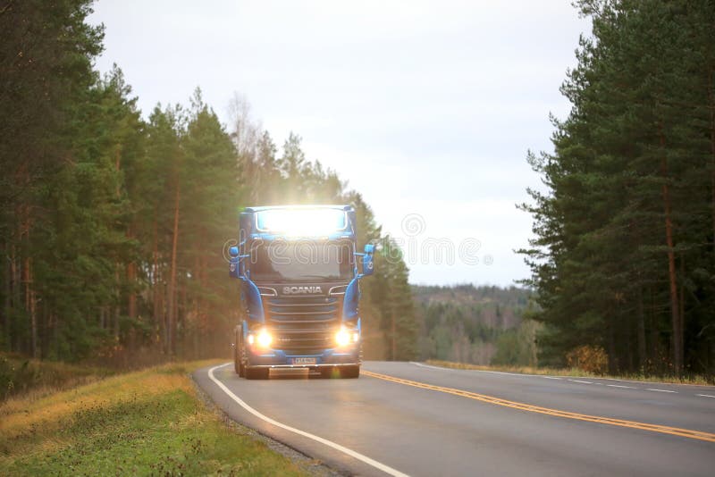 Blue Scania Lights Up Highway