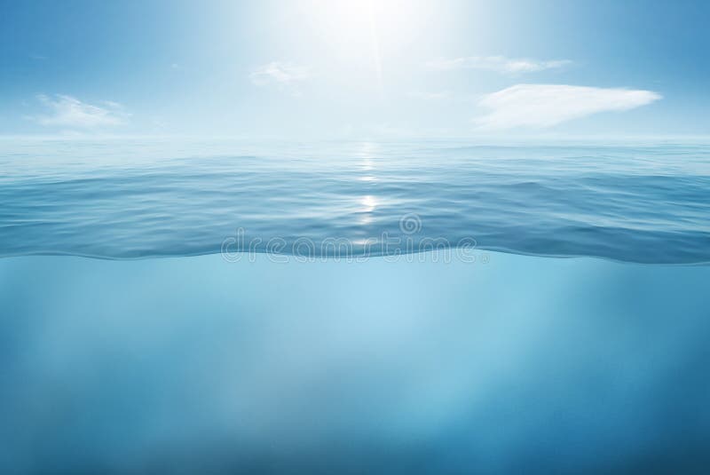 Blue sea or ocean water surface and underwater with sunny and cloudy sky