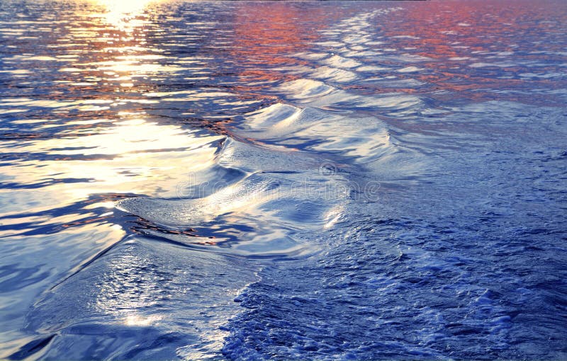 Blue sea water waves sunset from ship wake royalty free stock image Blue sea water waves sunset from ship wake royalty free stock image