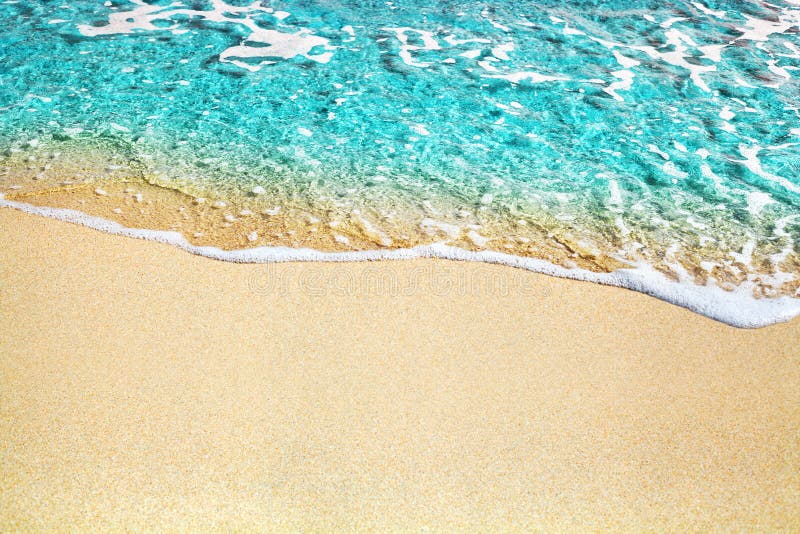 Blue sea wave, white foam, golden sand beach, turquoise ocean water close up, summer holidays border frame concept, copy space