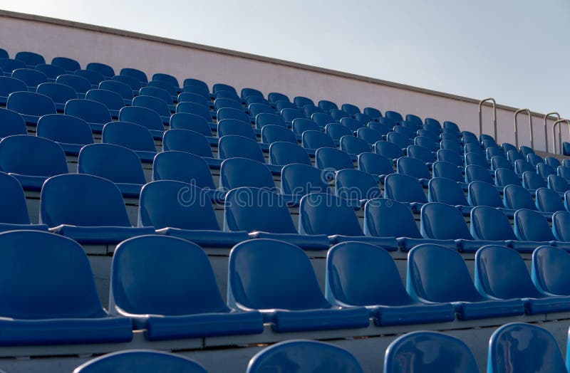 Bleachers In A Sports Stadium Blue Seats In A Row Stock Image