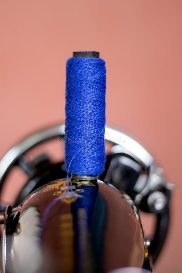 Blue Sewing Machine Rope on Top of a Sewing Machine Stock Photo Image