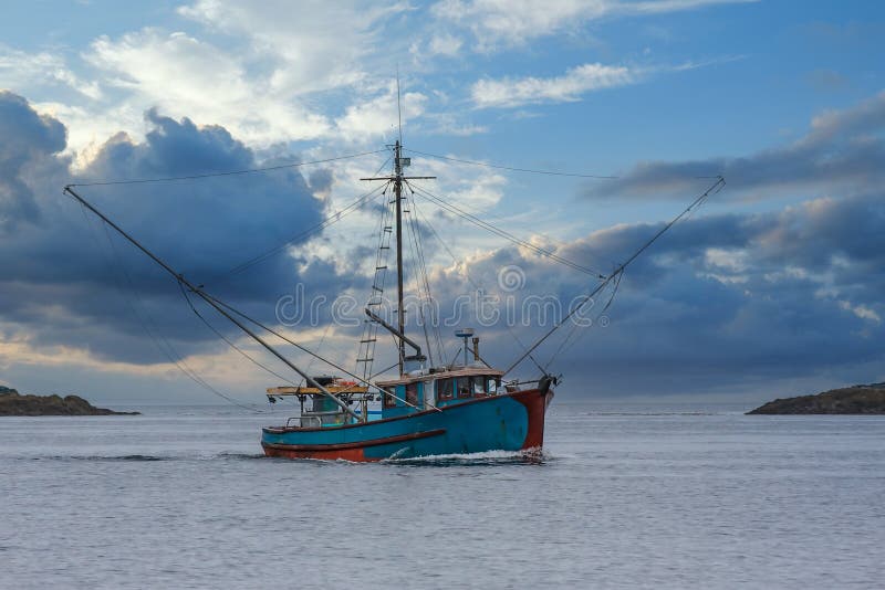 Blue Shrimp Boat on Dramatic Sky