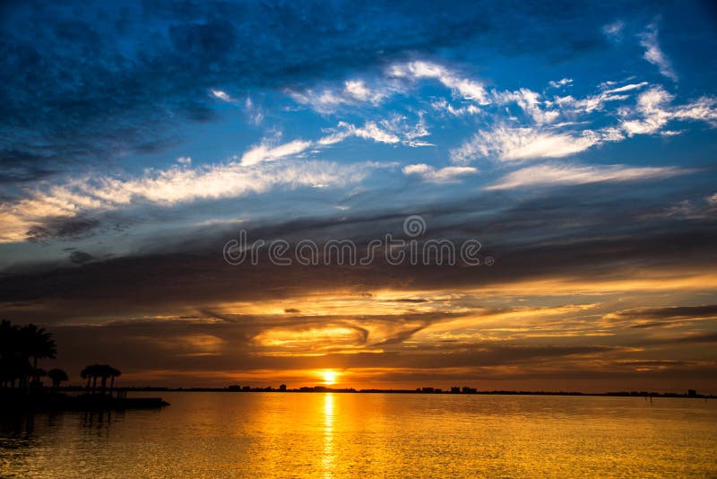 Blue Skies and Gold Sunset at sea evening seascape