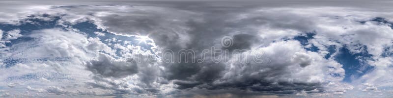 Blue sky with beautiful dark clouds before storm. Seamless hdri panorama 360 degrees angle view with zenith for use in 3d graphics. Or game development as sky stock photography Blue sky with beautiful dark clouds before storm. Seamless hdri panorama 360 degrees angle view with zenith for use in 3d graphics. Or game development as sky stock photography