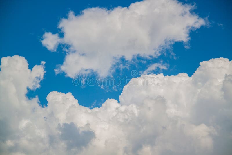 Blue sky and clouds abstract background with copy space. the beautiful sky with clouds as a background.