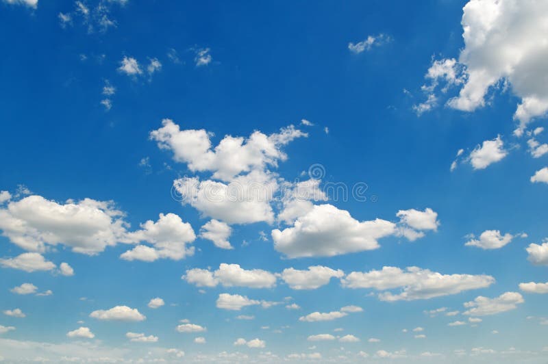 Blue sky and cumulus clouds royalty free stock photography
