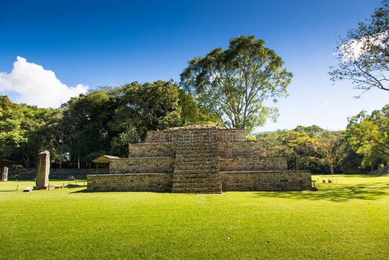 Blue sky day in an ancient pyramid at pre-columbian city of Copan, Honduras