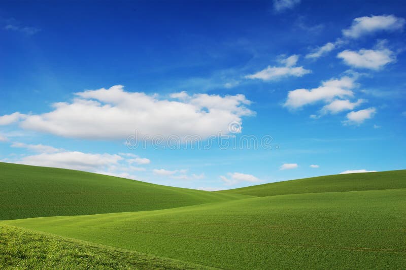 Verdi colline ed un cielo blu