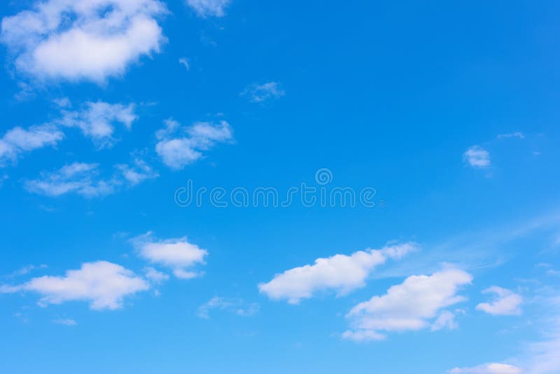 Blue sky with light white clouds -  background