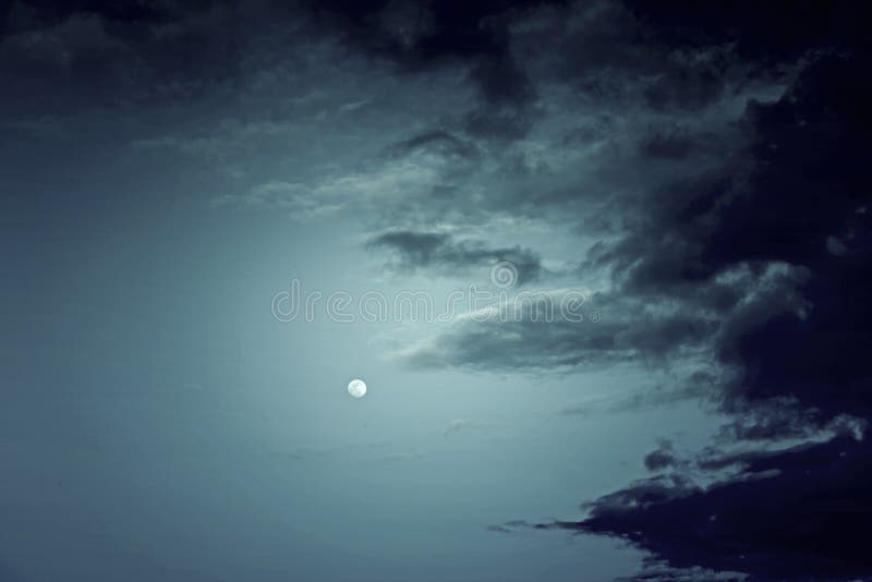 Blue sky with moon stock images
