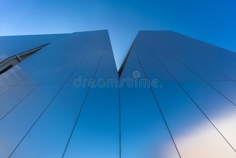 Tokyo, Sumida-ku - Nobember 17, 2017 : Blue sky reflections on side view of Sumida Hokusai Museum (Sumida Hokusai Bijutsukan). Designed by Kazuyo Sejima