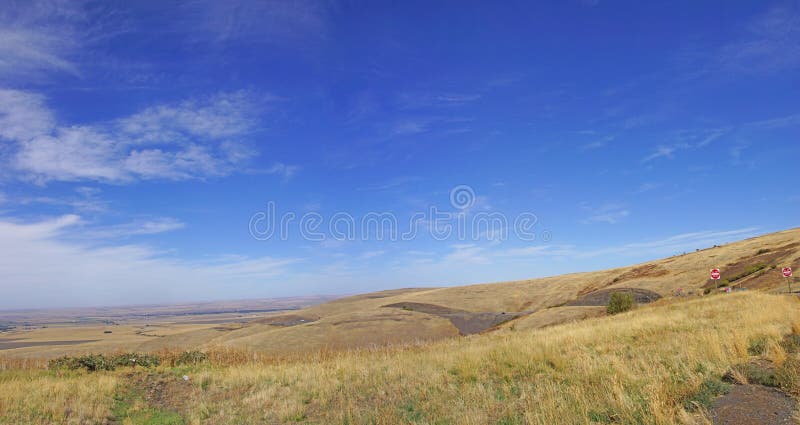 Blue sky and rolling hills