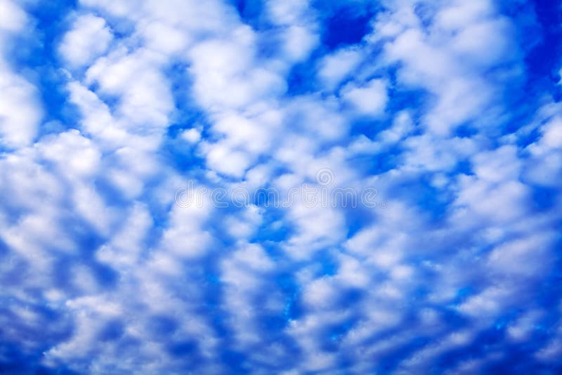 Blue sky with small white clouds stock images Blue sky with small white clouds stock images