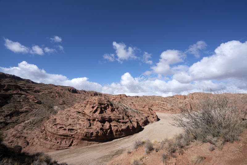 Blue sky white clouds and colorful Wensu Grand Canyon in Autumn royalty free stock photos Blue sky white clouds and colorful Wensu Grand Canyon in Autumn royalty free stock photos