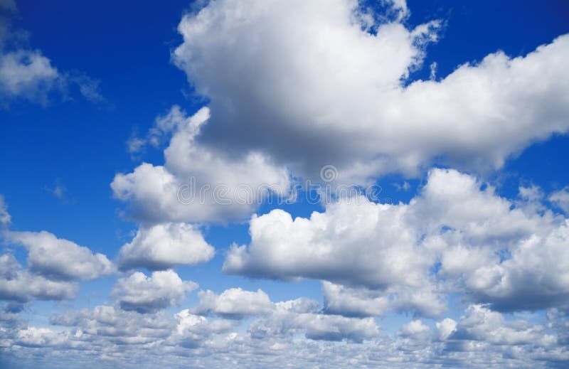 Blue sky with white cumulus clouds