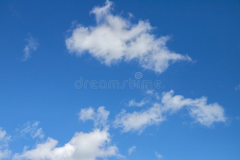 Blue sky with white cumulus clouds on a daytime