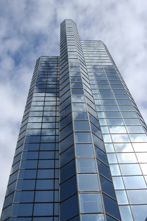 Blue Skyscraper stock image. Image of blue, mirror, clouds - 1760761 : An amazing photo capturing a gorgeous scenery. Its colors are striking and combination ideally. The arrangement looks wonderful, with its details are very defined.