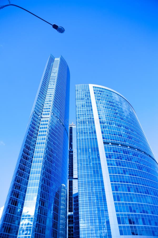 Blue skyscrapers stock image. Image of outdoors, background - 11404811 : A amazing photo depicting a gorgeous view. Its tones are just bold and mix perfectly. The composition is great, and the particulars are also extremely clear.