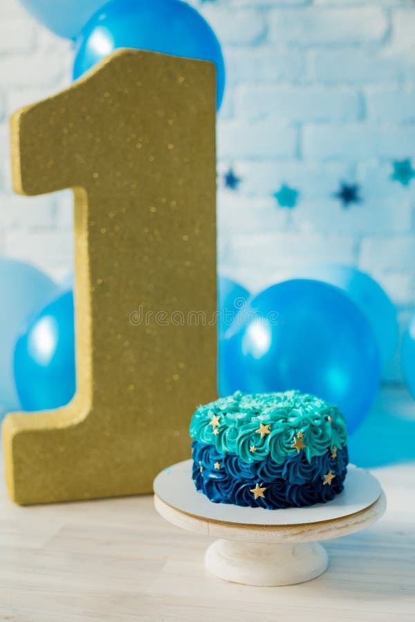 Blue smash cake for boy birthday stock photo