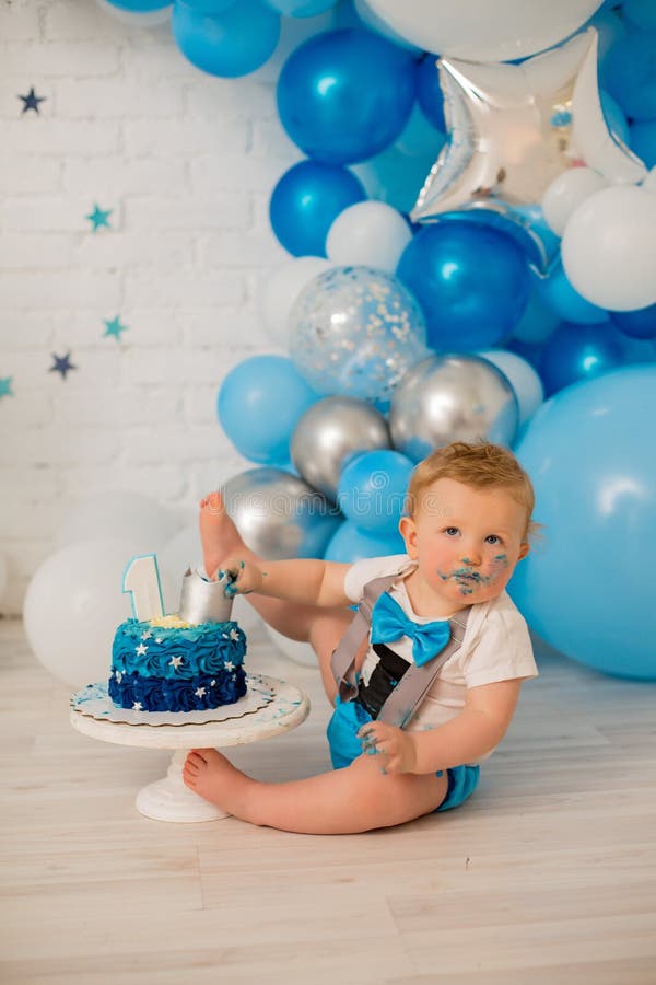 Blue smash cake for boy birthday royalty free stock photography
