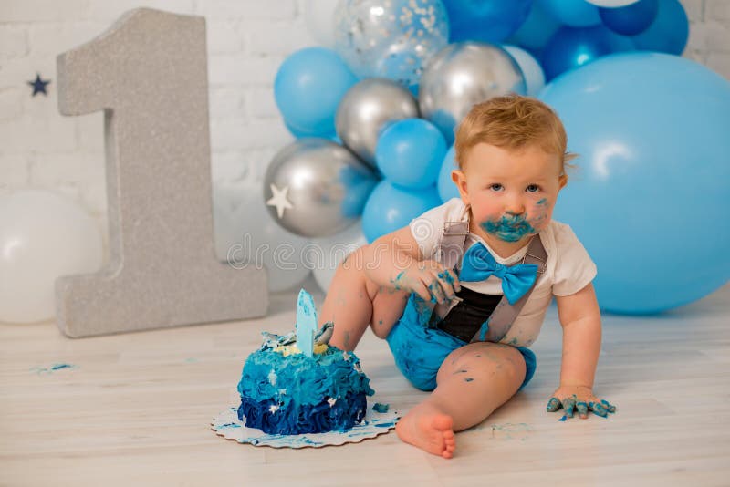 Blue smash cake for boy birthday royalty free stock photography