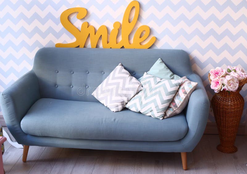 Blue Sofa in Cozy Bedroom with Pillows and Vase Stock Image Image of