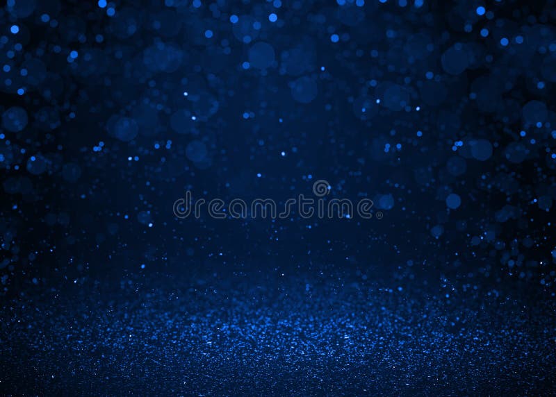 Blue sparkle glitter abstract background.