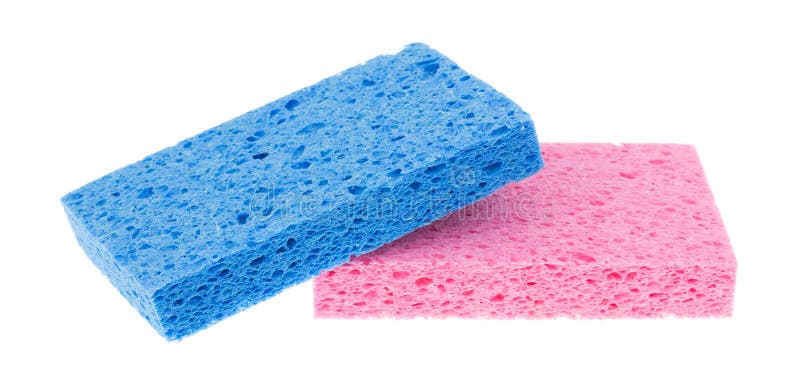 A blue sponge at an angle atop a pink sponge isolated on a white background. A blue sponge at an angle atop a pink sponge isolated on a white background.