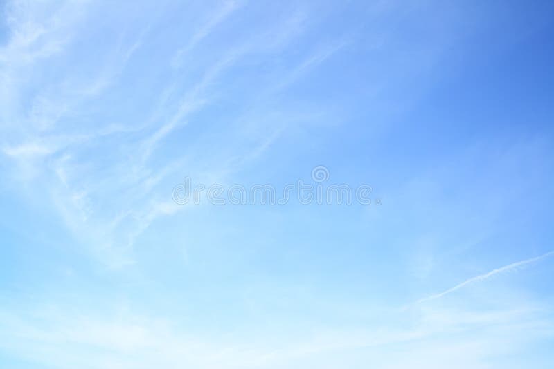 Blue spring sky with light clouds