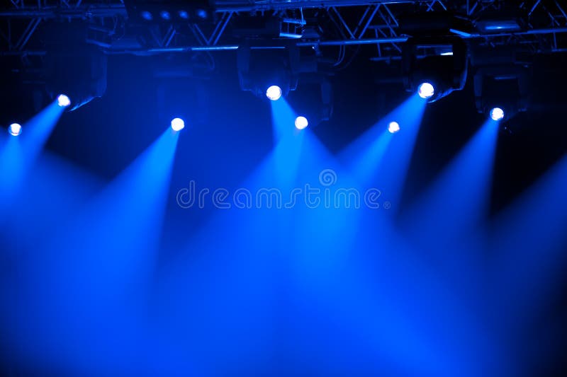 Blue stage spotlights stock photo