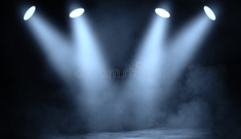 Blue studio spotlight . Stage with smoke on the floor