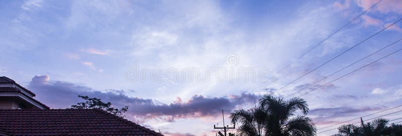 Blue sunset sky with clouds