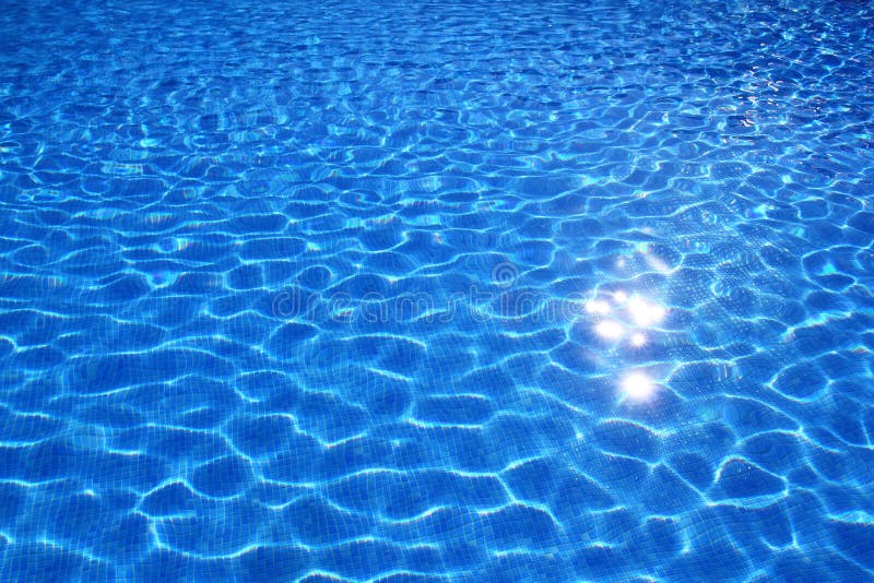 Blue tiles swimming pool water reflection texture