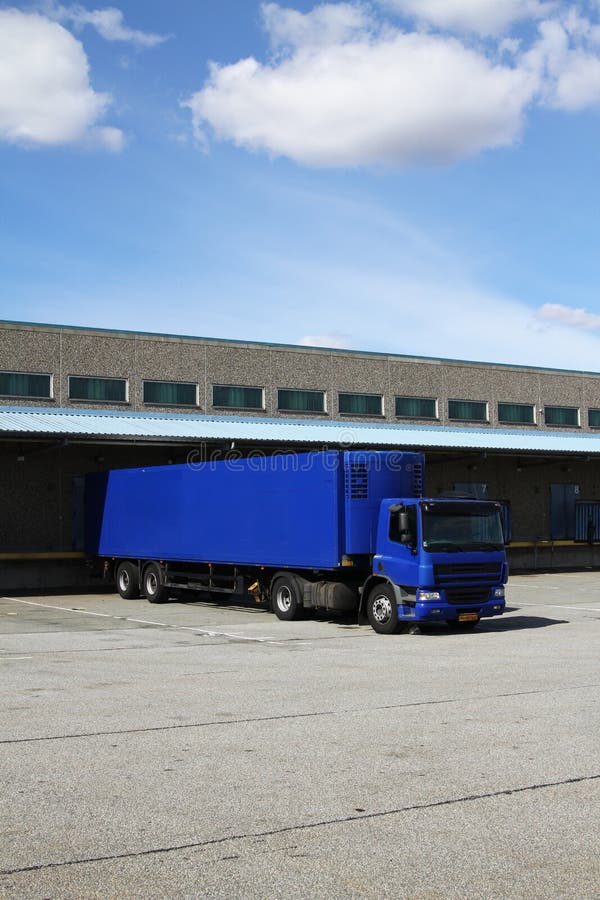 Blue truck at dock royalty free stock images