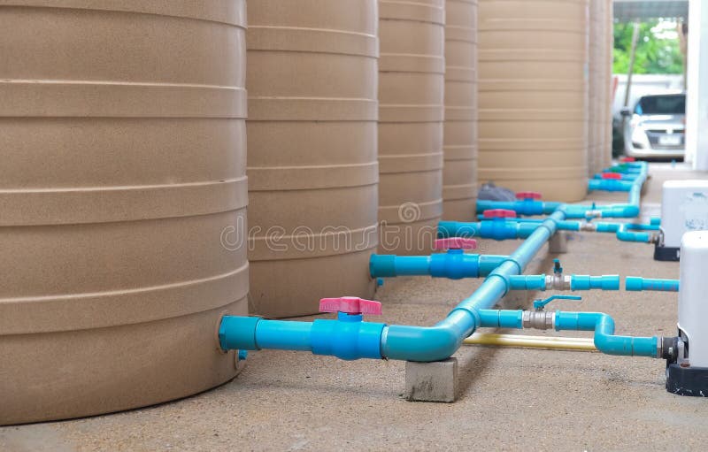 Blue Water Pipe Installation Pump To Tank. Stock Photo Image of