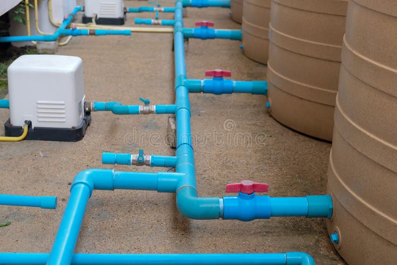 Blue Water Pipe Installation Pump To Tank. Stock Image Image of