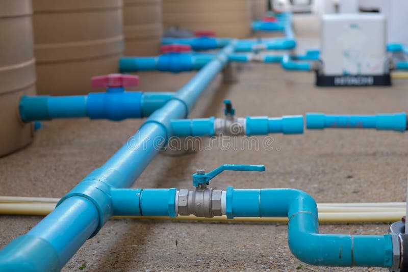 Blue Water Pipe Installation Pump To Tank. Stock Photo Image of
